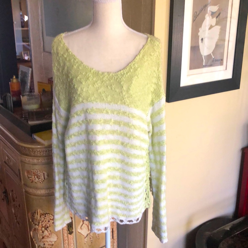 Free People is a light green and white